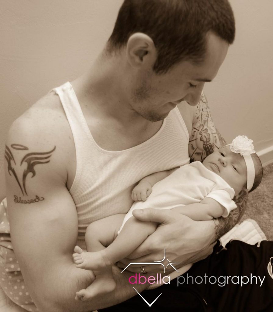 dad holding newborn